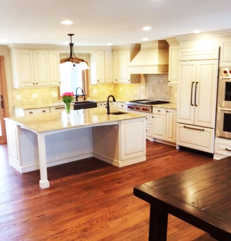 New Hard Wood Plank Kitchen Flooring and Updated Cream Kitchen Cabinets